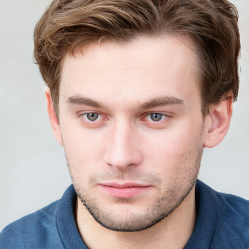 Neutral white young-adult male with short  brown hair and blue eyes