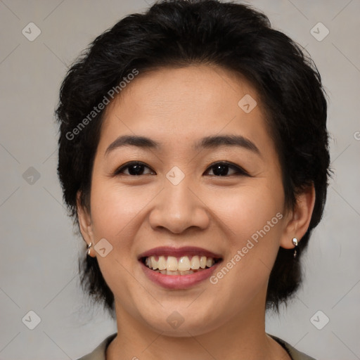 Joyful asian young-adult female with medium  black hair and brown eyes