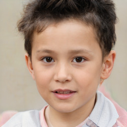 Joyful white child male with short  brown hair and brown eyes