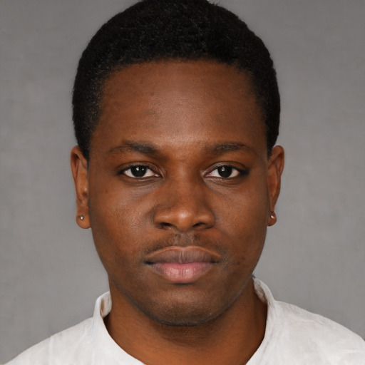 Neutral black young-adult male with short  brown hair and brown eyes