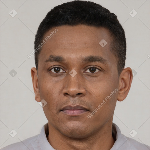 Neutral black young-adult male with short  black hair and brown eyes