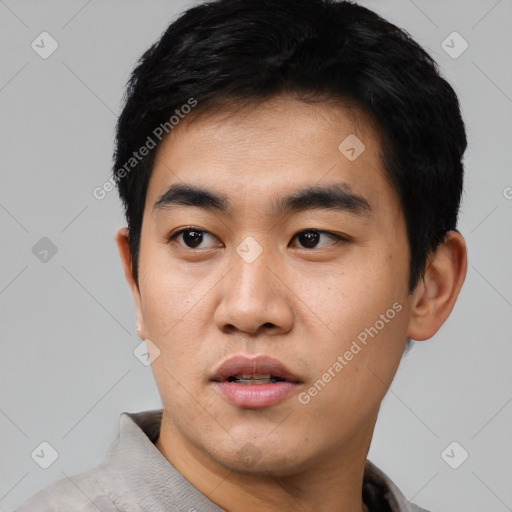 Neutral asian young-adult male with short  black hair and brown eyes