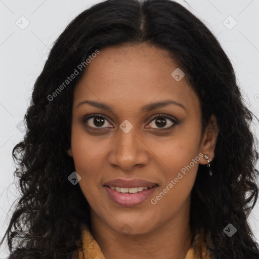 Joyful black young-adult female with long  brown hair and brown eyes