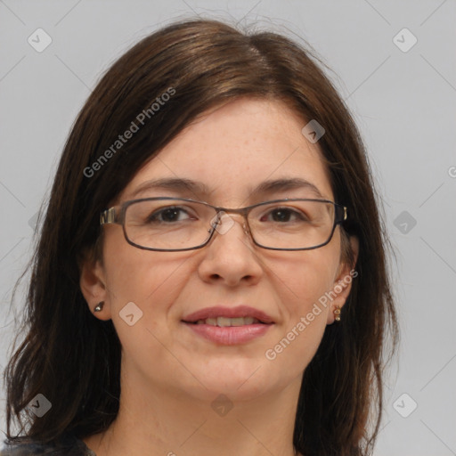 Joyful white adult female with medium  brown hair and brown eyes