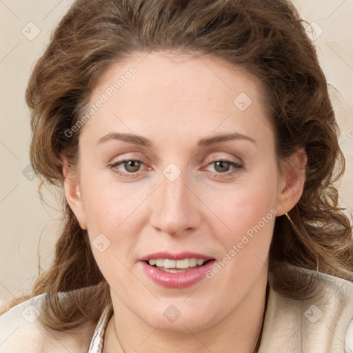 Joyful white young-adult female with medium  brown hair and green eyes