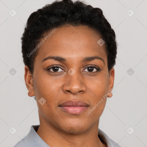 Joyful black young-adult female with short  brown hair and brown eyes