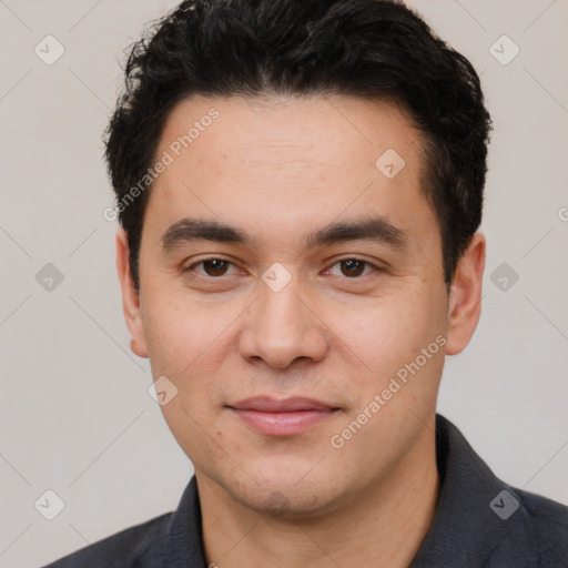 Joyful white young-adult male with short  black hair and brown eyes