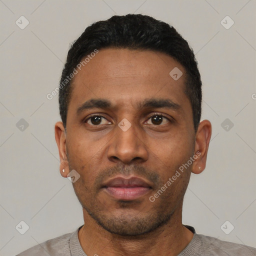 Neutral latino young-adult male with short  black hair and brown eyes