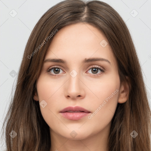 Neutral white young-adult female with long  brown hair and brown eyes