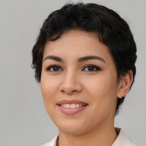 Joyful asian young-adult female with short  brown hair and brown eyes