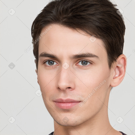 Neutral white young-adult male with short  brown hair and brown eyes