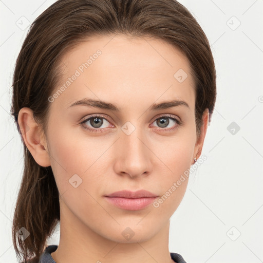 Neutral white young-adult female with medium  brown hair and grey eyes