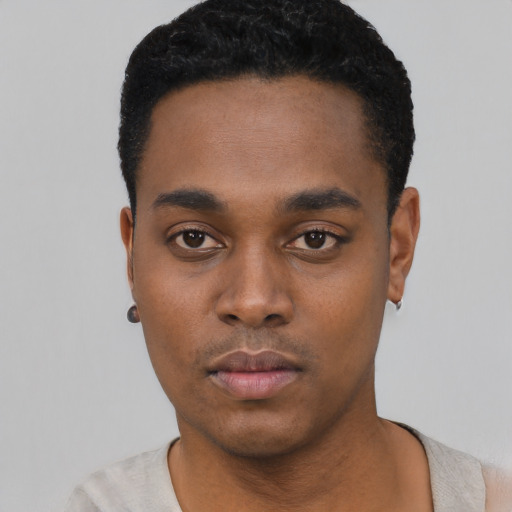 Neutral black young-adult male with short  black hair and brown eyes