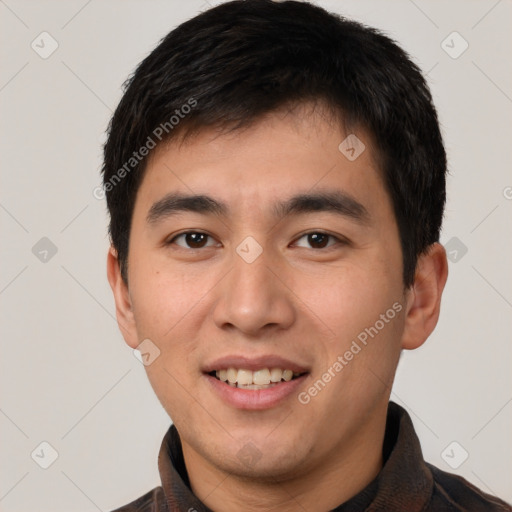 Joyful white young-adult male with short  black hair and brown eyes