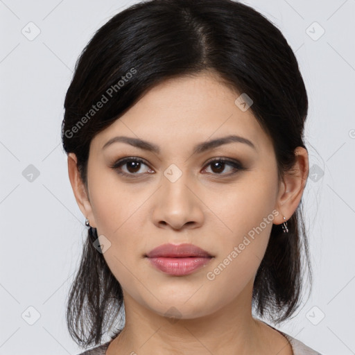 Joyful asian young-adult female with medium  black hair and brown eyes