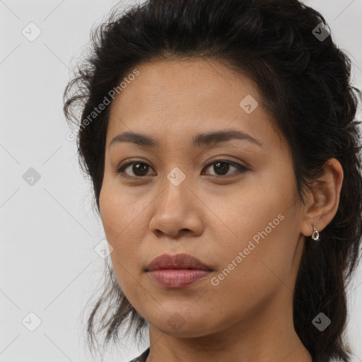 Joyful asian young-adult female with long  brown hair and brown eyes