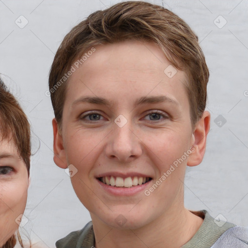 Joyful white young-adult female with short  brown hair and grey eyes