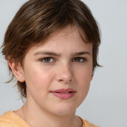 Joyful white child female with medium  brown hair and brown eyes