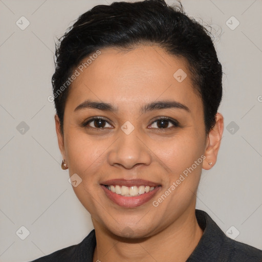 Joyful latino young-adult female with short  black hair and brown eyes