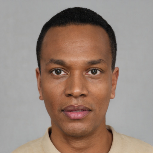 Neutral black young-adult male with short  black hair and brown eyes