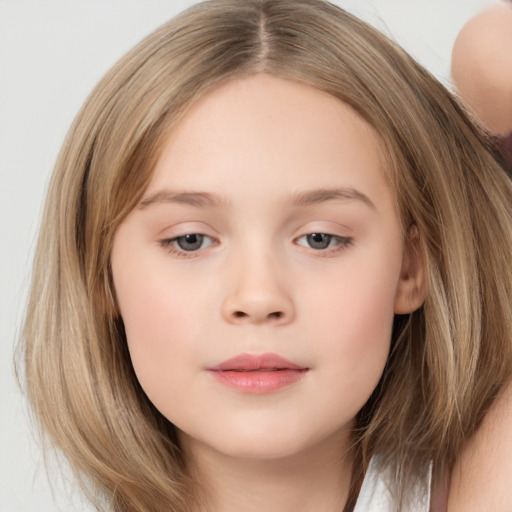 Neutral white child female with long  brown hair and brown eyes