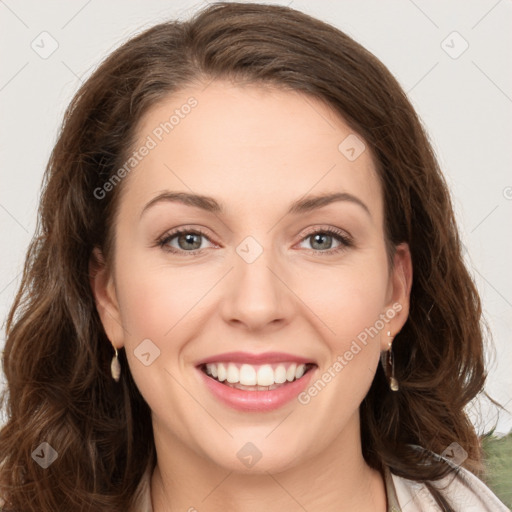 Joyful white young-adult female with long  brown hair and green eyes