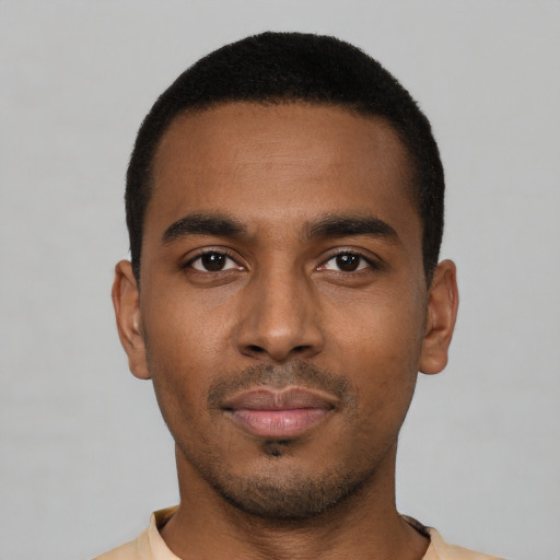 Neutral black young-adult male with short  black hair and brown eyes