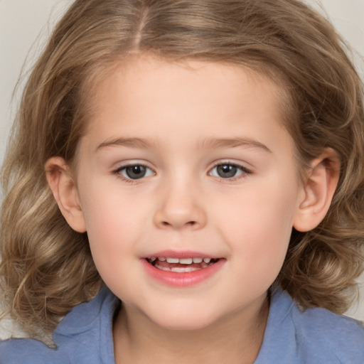 Joyful white child female with medium  brown hair and brown eyes