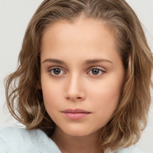 Neutral white child female with medium  brown hair and brown eyes