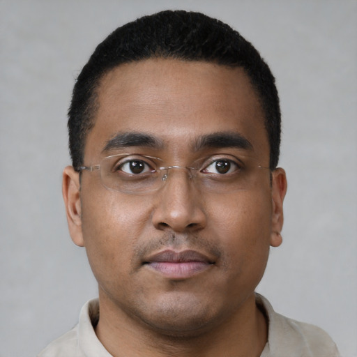 Neutral black young-adult male with short  black hair and brown eyes