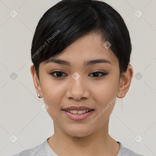 Joyful asian young-adult female with short  black hair and brown eyes