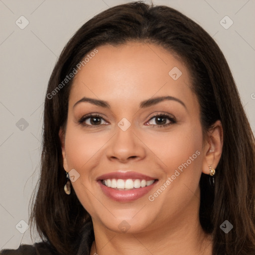 Joyful white young-adult female with long  brown hair and brown eyes