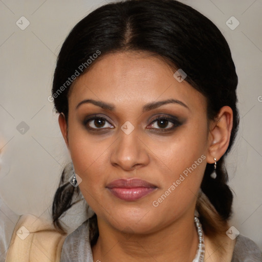 Joyful latino young-adult female with medium  brown hair and brown eyes