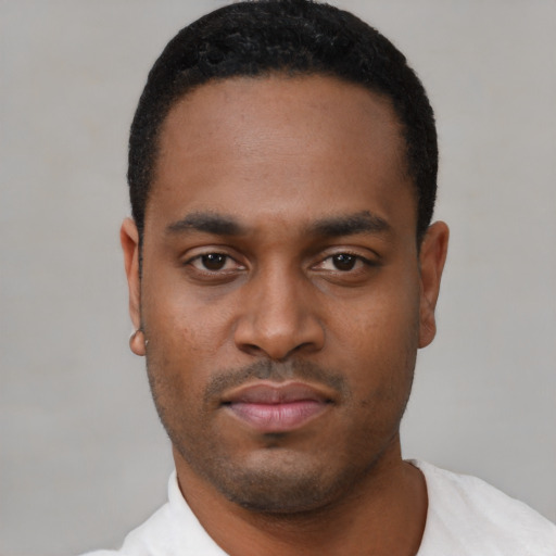 Neutral black young-adult male with short  black hair and brown eyes