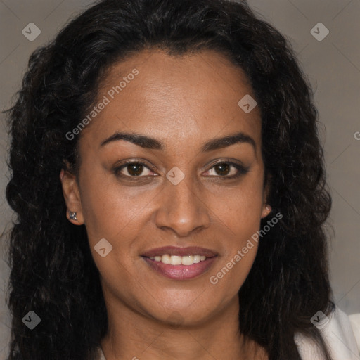 Joyful black young-adult female with long  brown hair and brown eyes