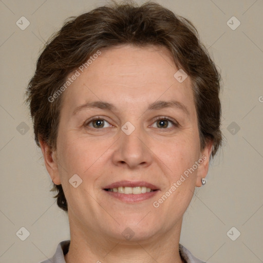 Joyful white adult female with short  brown hair and brown eyes