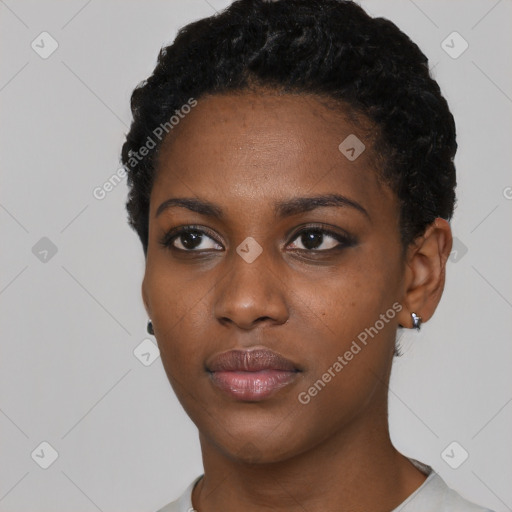 Neutral black young-adult female with short  black hair and brown eyes