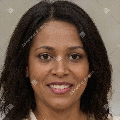 Joyful black young-adult female with long  brown hair and brown eyes