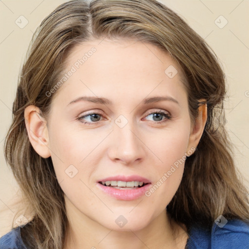 Joyful white young-adult female with medium  brown hair and blue eyes