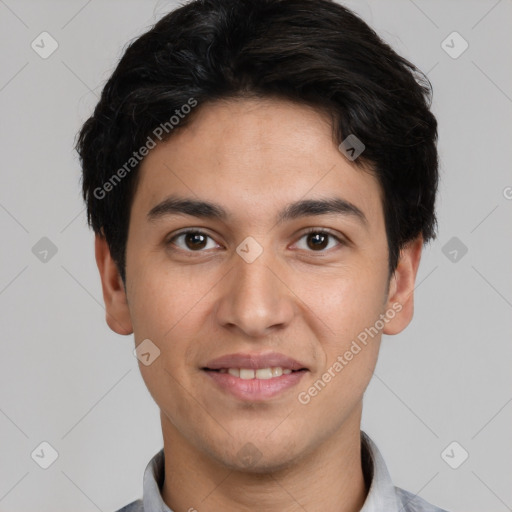 Joyful white young-adult male with short  black hair and brown eyes