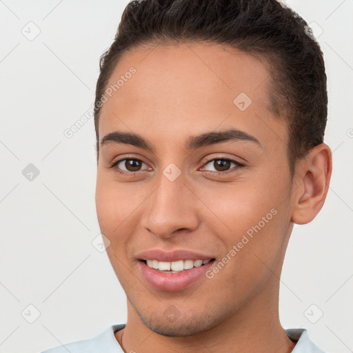 Joyful white young-adult female with short  brown hair and brown eyes