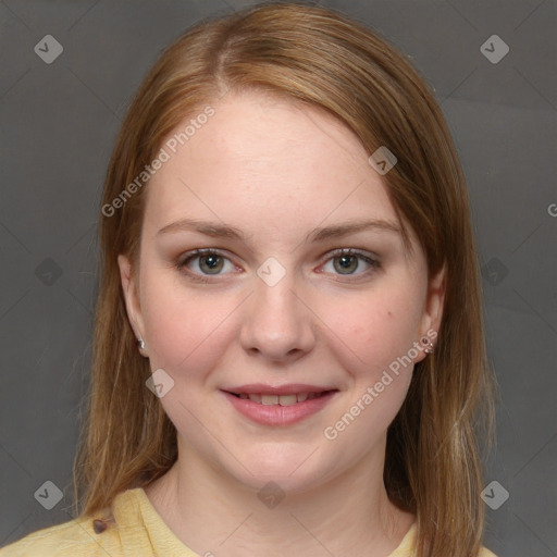 Joyful white young-adult female with medium  brown hair and blue eyes