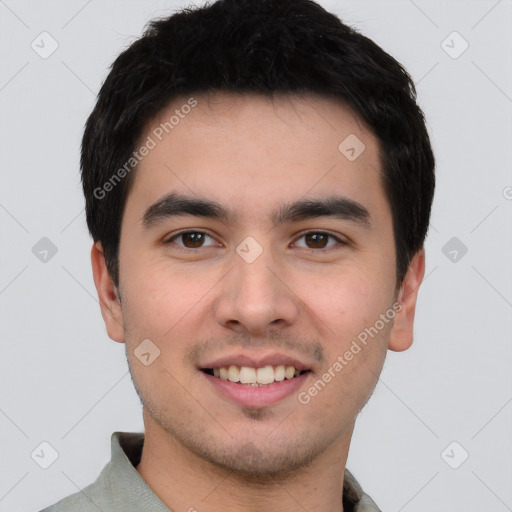 Joyful white young-adult male with short  black hair and brown eyes