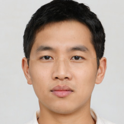 Neutral asian young-adult male with short  black hair and brown eyes