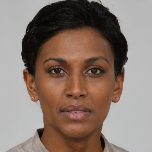Neutral black young-adult female with short  brown hair and brown eyes