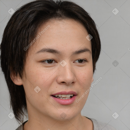 Joyful asian young-adult female with medium  brown hair and brown eyes