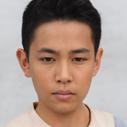 Neutral asian young-adult male with short  brown hair and brown eyes