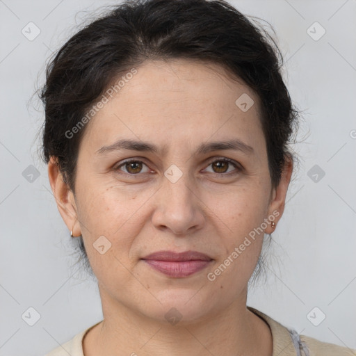 Joyful white adult female with short  brown hair and brown eyes