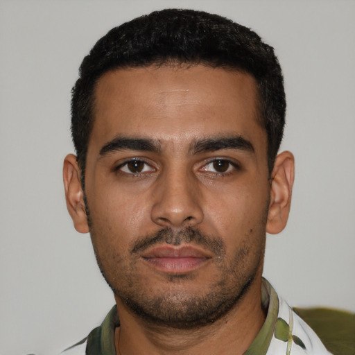 Neutral latino young-adult male with short  black hair and brown eyes