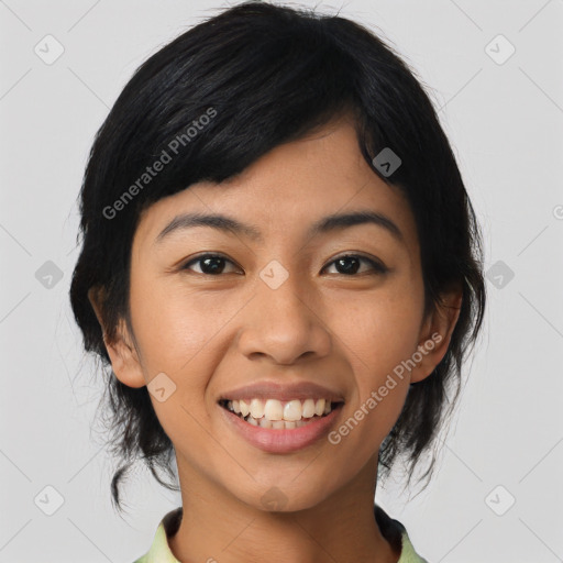 Joyful asian young-adult female with medium  black hair and brown eyes